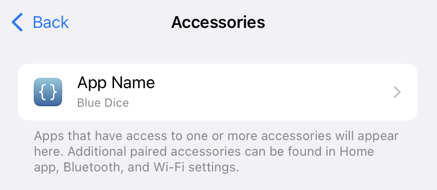 Accessories settings screen listing “App Name” as having access to the Bluetooth device “Blue Dice.” A note explains that apps with accessory access appear here.