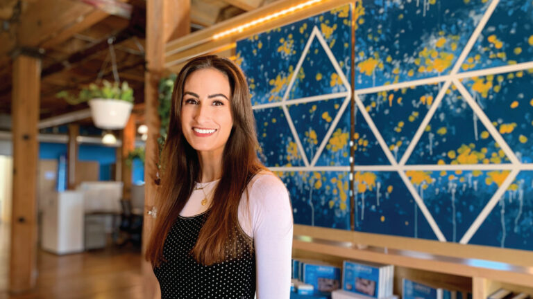 Erin standing in Punch Through office