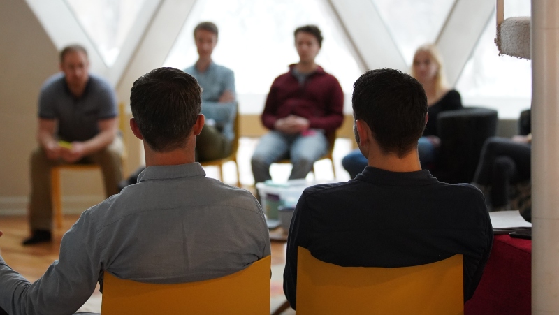 Punch Through team discussing mobile development
