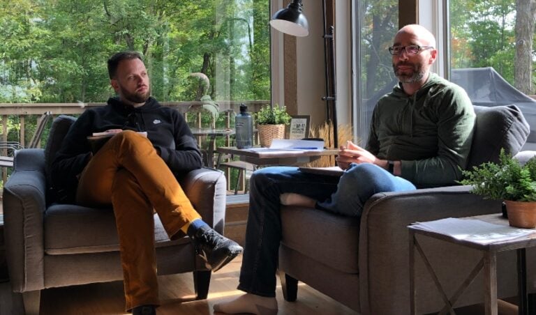 engineers sitting discussing Apple's Swift Package Manager
