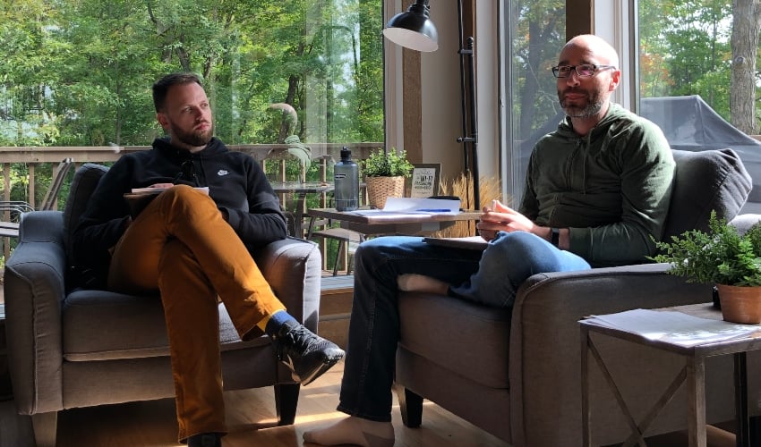 engineers sitting discussing Apple's Swift Package Manager