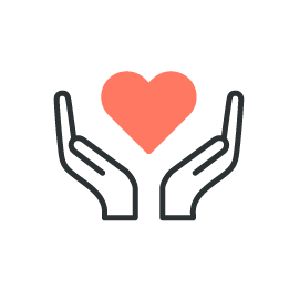 Two hands holding a heart between them.